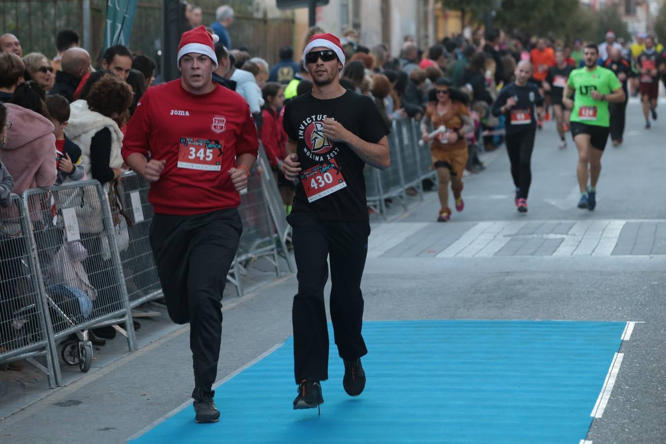 Casi un millar de corredores despiden el año disfrutando del deporte en la Ciudad del Sol por una buena causa