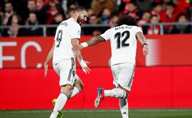 Benzema y Marcelo celebran el primer gol del francés.