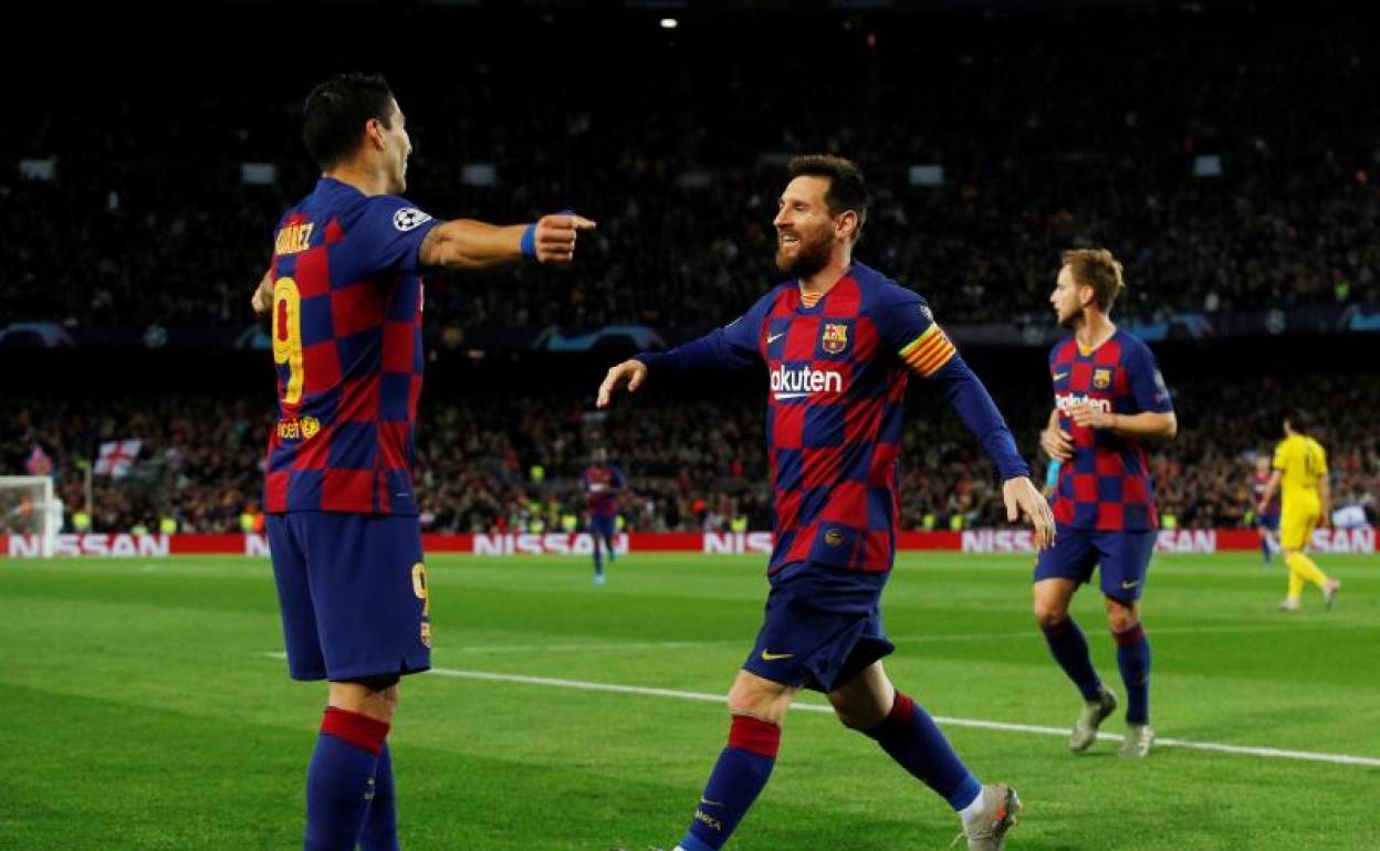 Messi y Luis Suárez celebran el primer gol ante el Dortmund. 