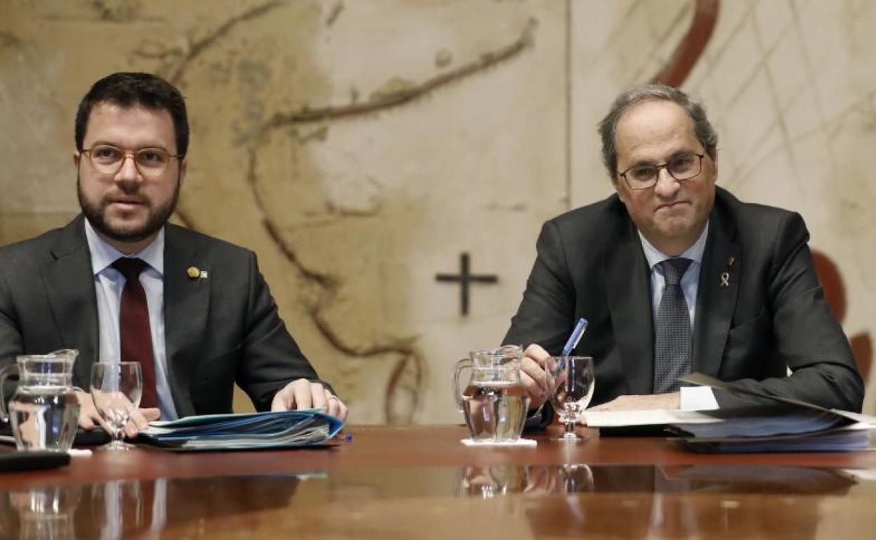 El presidente de la Generalitat, Quim Torra, junto a su vicepresidente, Pere Aragonés 