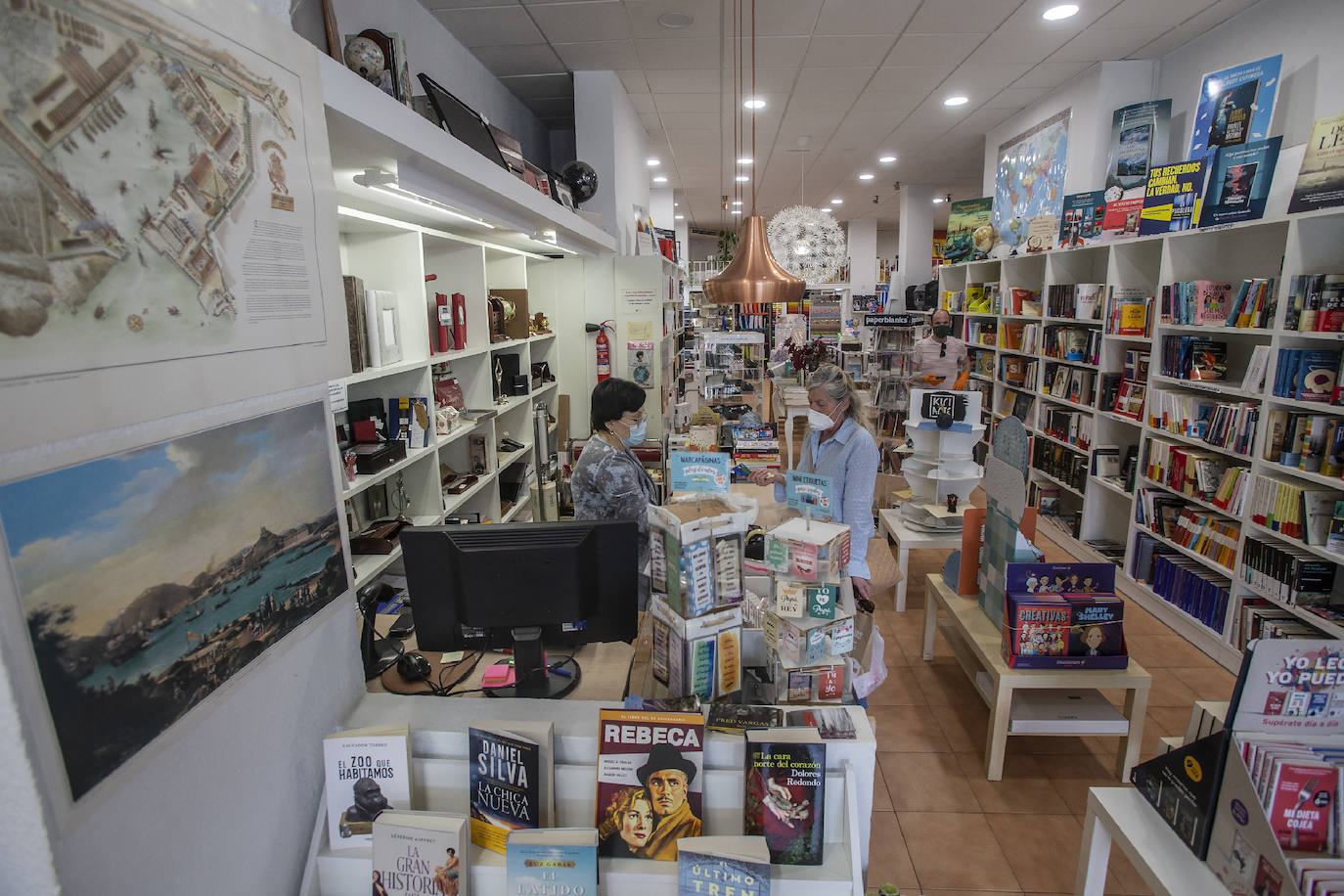 Fotos: Los pequeños comercios de Cartagena reabren sus puertas