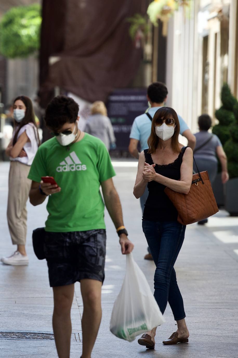 Fotos: Las mascarillas toman las calles de Murcia