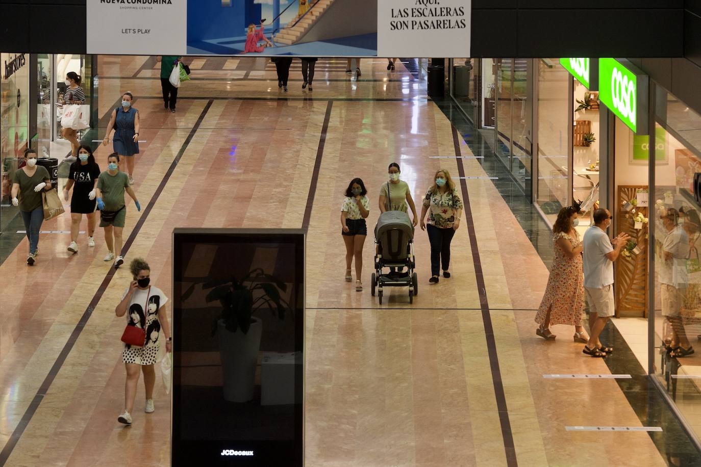 Fotos: Los centros comerciales vuelven tras más de dos meses