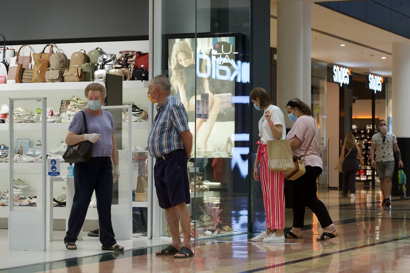 Fotos: Los centros comerciales vuelven tras más de dos meses
