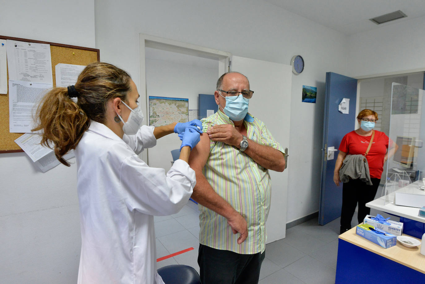 Fotos: Los centros de salud se quedan sin dosis de la vacuna de la gripe ante la alta demanda