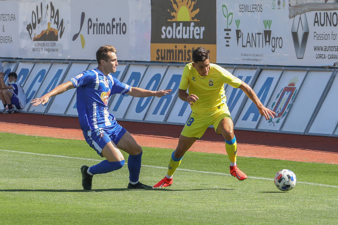 Fotos: Justo reparto de puntos para el Lorca en un partido de trámite