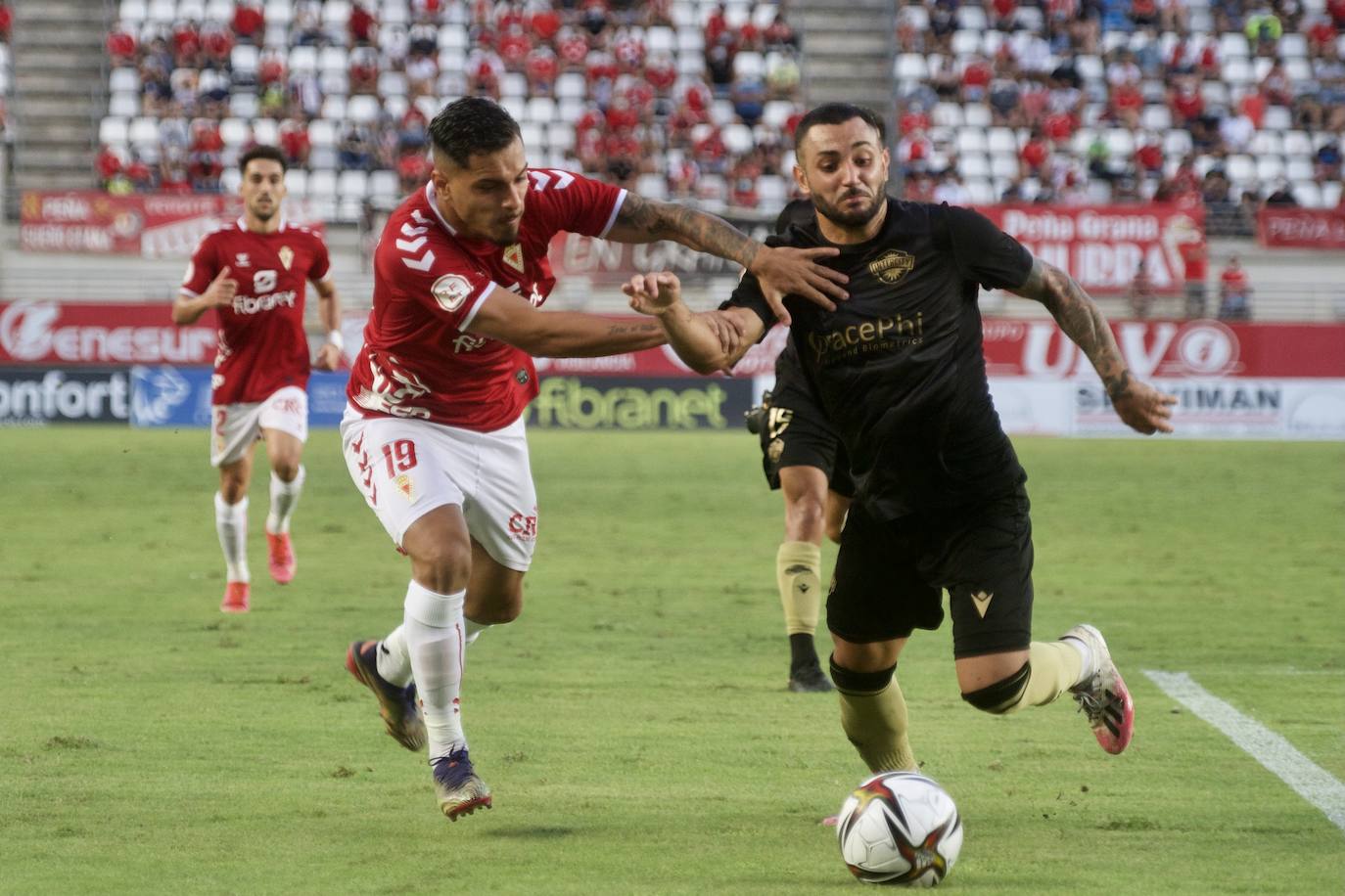 Los jugadores del Real Murcia celebran uno de los goles. 