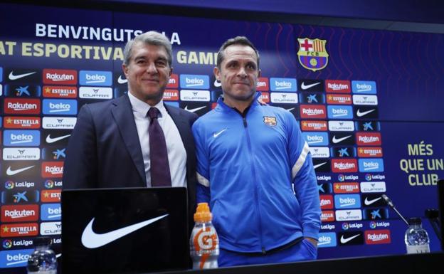 Joan Laporta y Sergi Barjuan. 