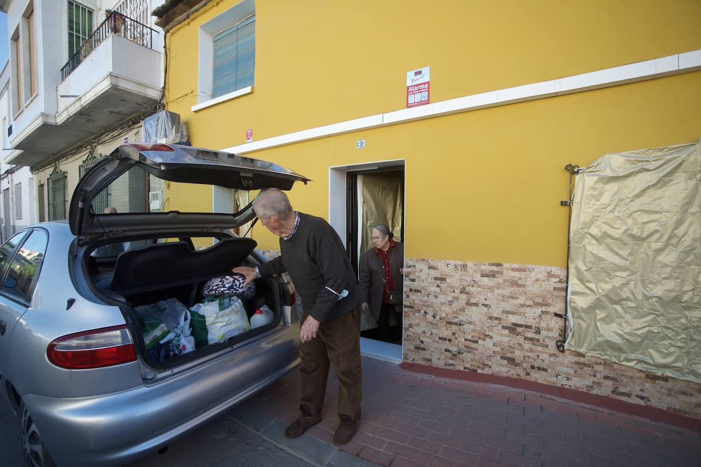 Fotos: Los últimos vecinos de la Orilla de la Vía se despiden de sus hogares