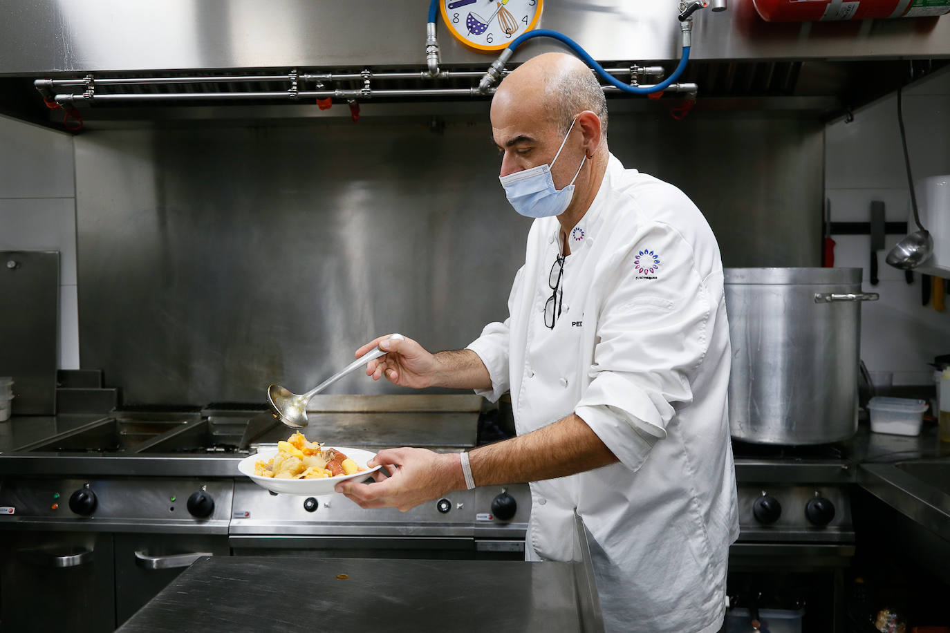 Fotos: Cocido para la mesa de Cáritas