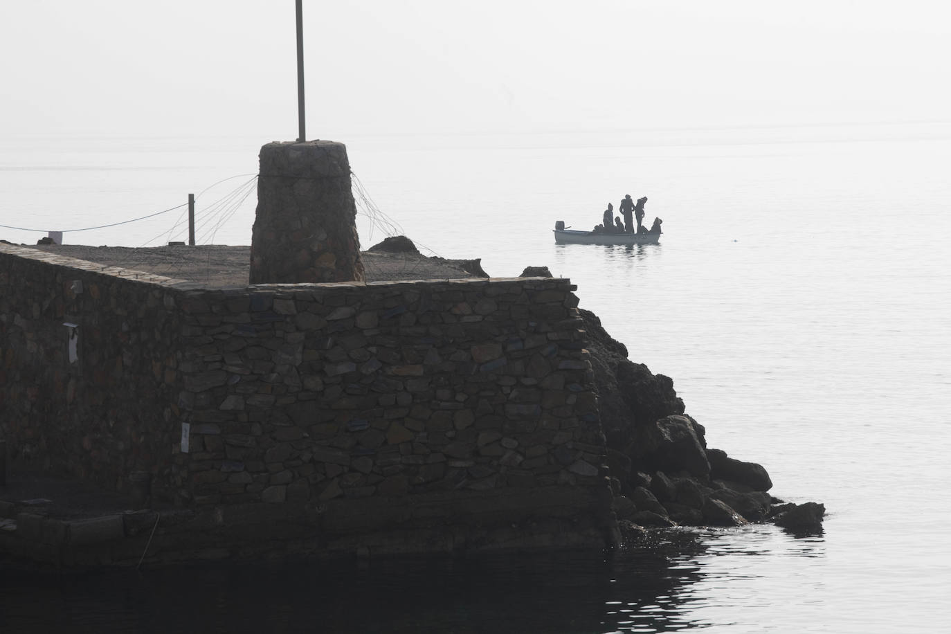 Fotos: Una patera con diez personas a bordo llega a Isla Plana, en Cartagena