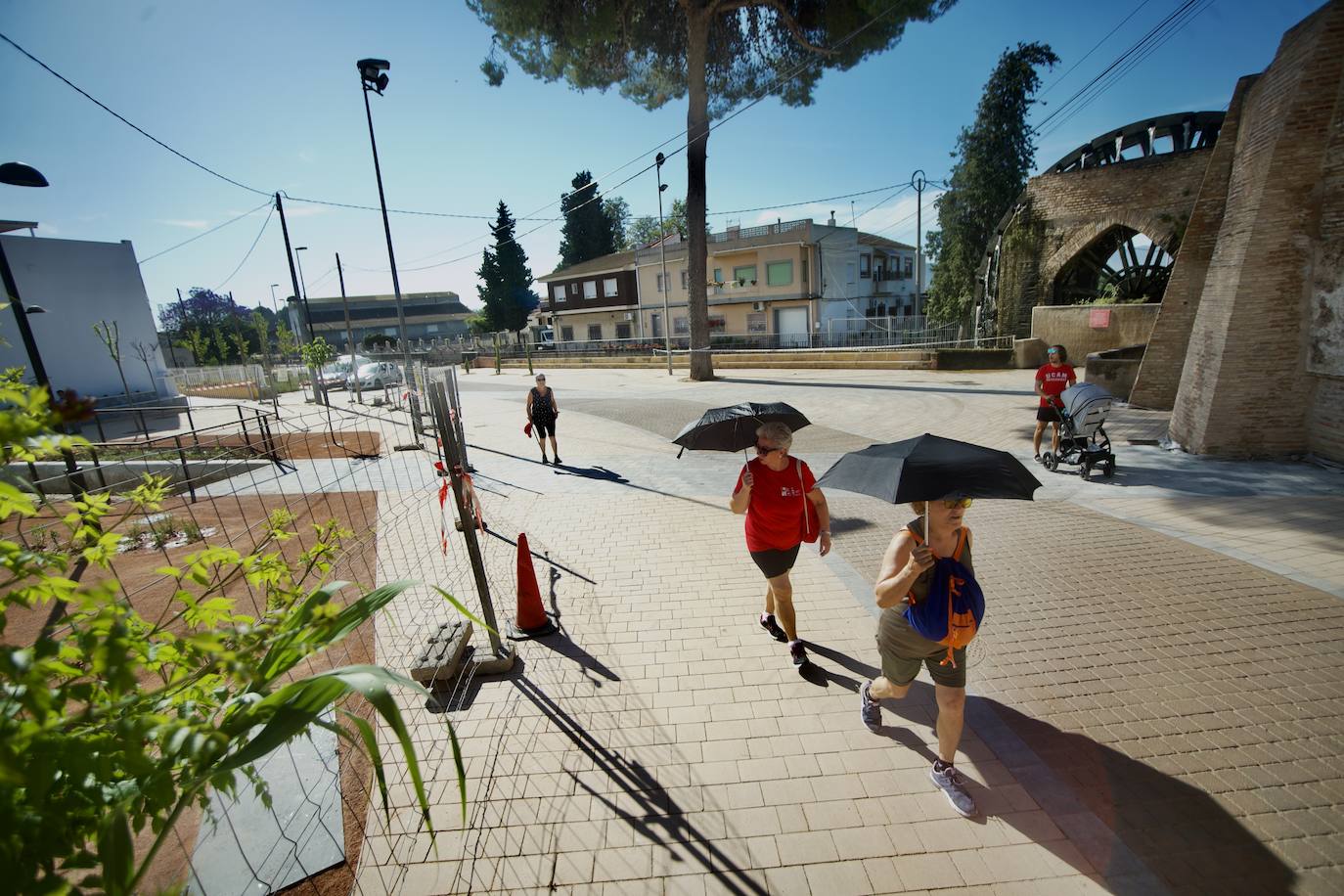 Fotos: La renovación del entorno de la rueda de La Ñora, en imágenes