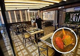 El personal de sala prepara las mesas en el comedor.