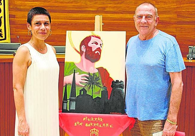 Mari Carmen Morales, alcaldesa de Beniel, y Carlos Menéndez, autor del cartel de las fiestas.