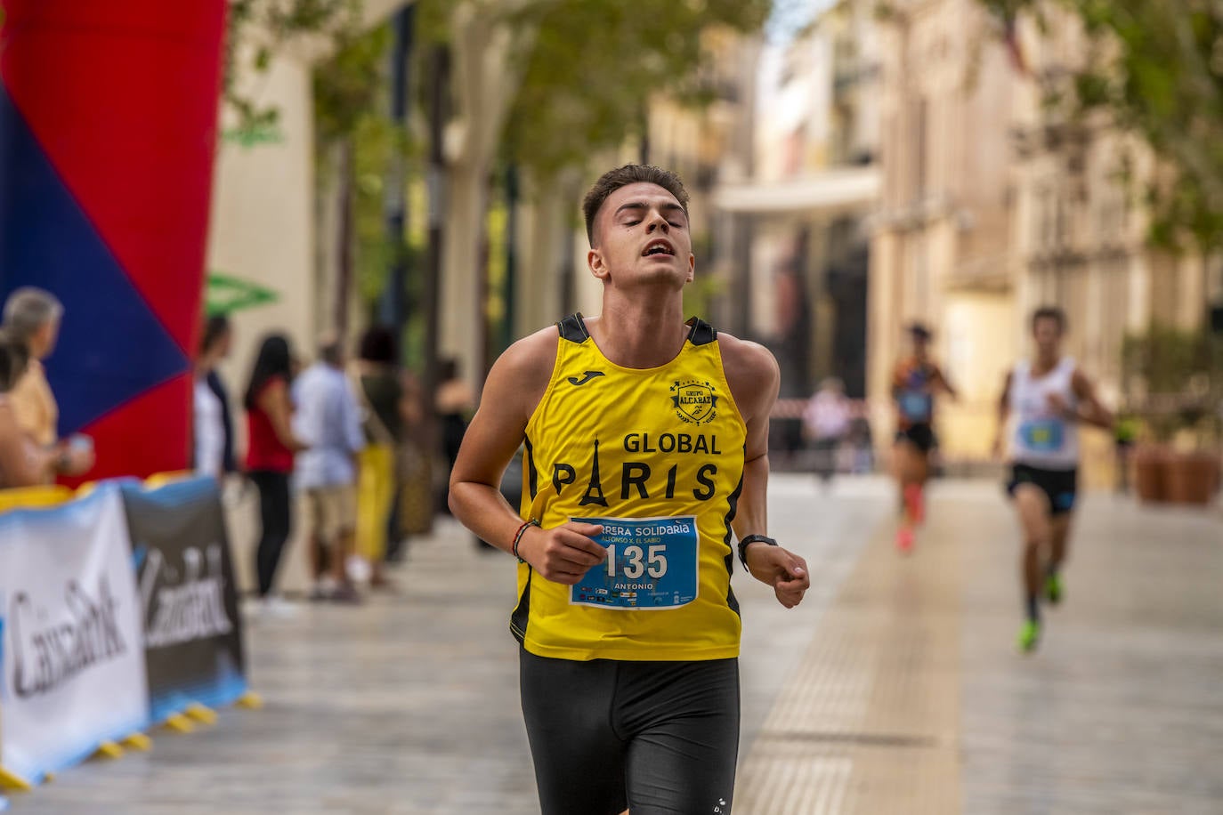 La I Carrera Solidaria Alfonso X de la Feria de Murcia, en imágenes