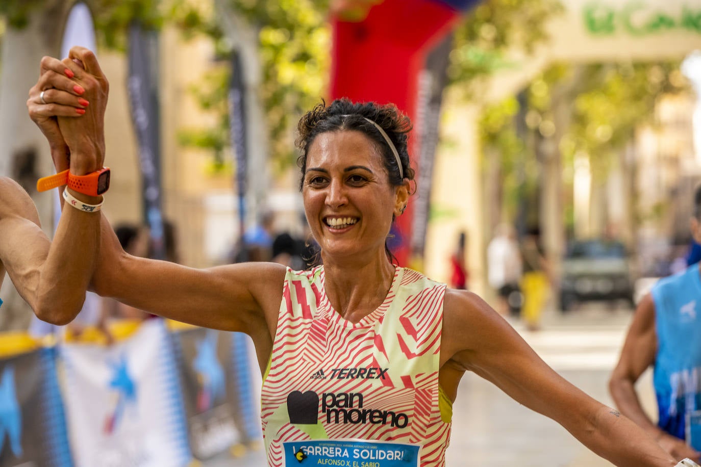 La I Carrera Solidaria Alfonso X de la Feria de Murcia, en imágenes