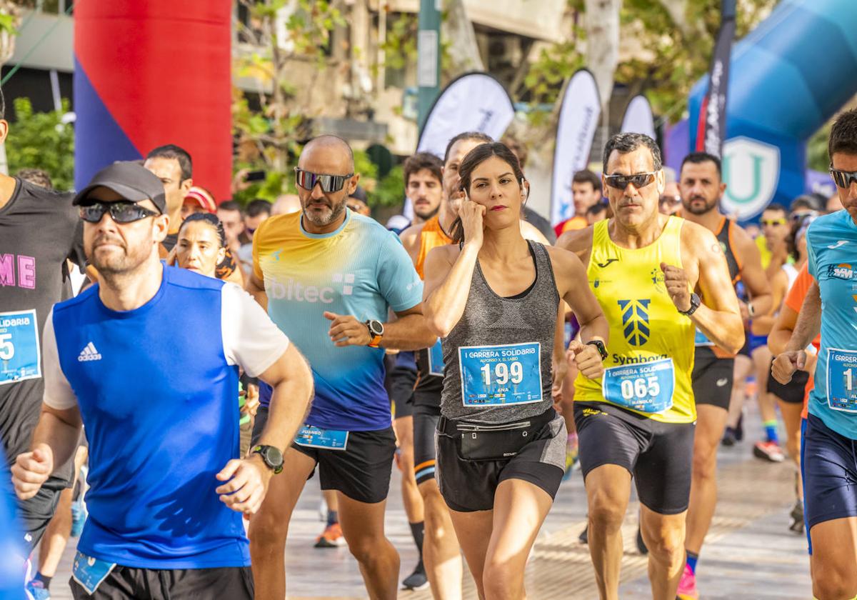 La I Carrera Solidaria Alfonso X de la Feria de Murcia, en imágenes