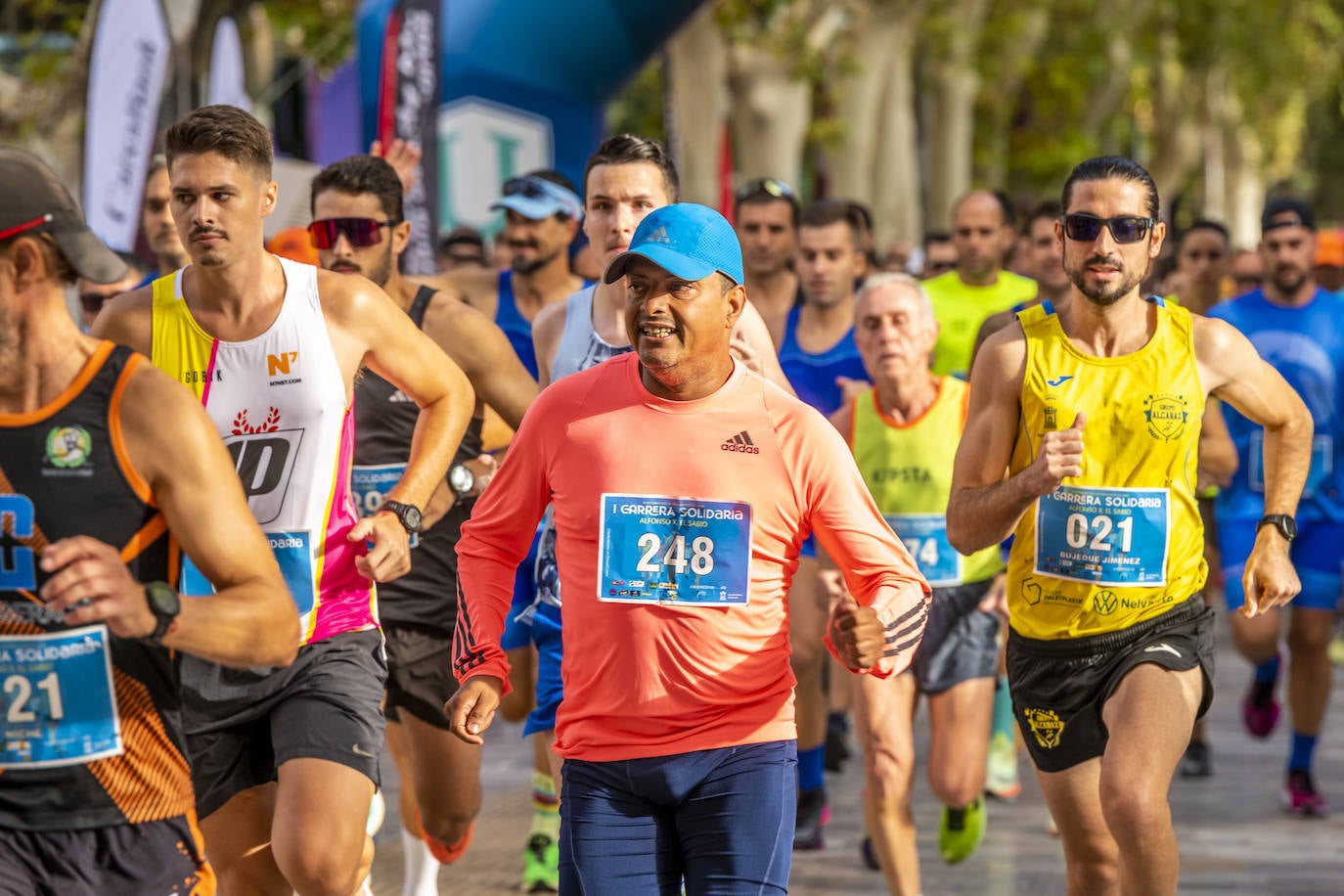 La I Carrera Solidaria Alfonso X de la Feria de Murcia, en imágenes