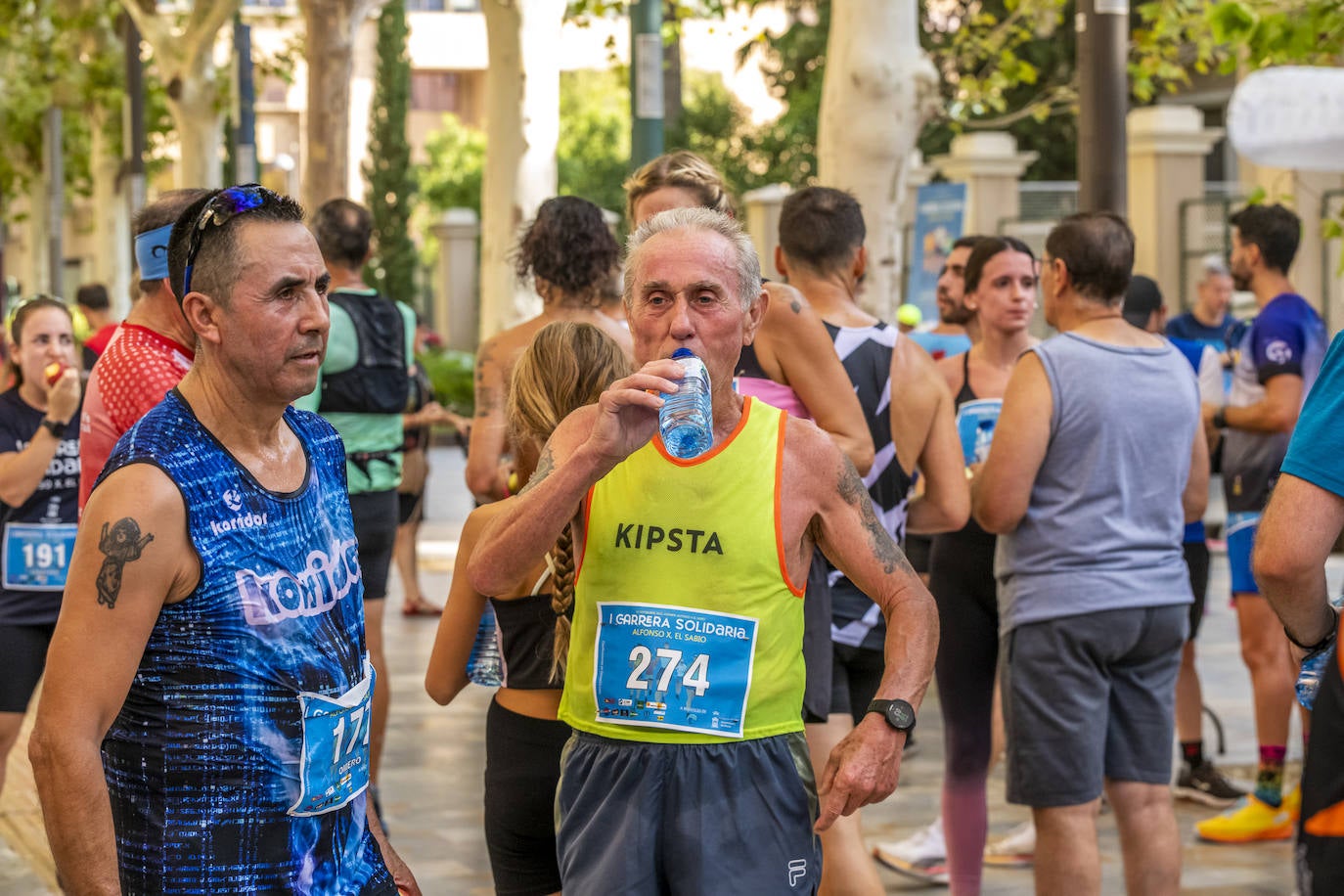 La I Carrera Solidaria Alfonso X de la Feria de Murcia, en imágenes