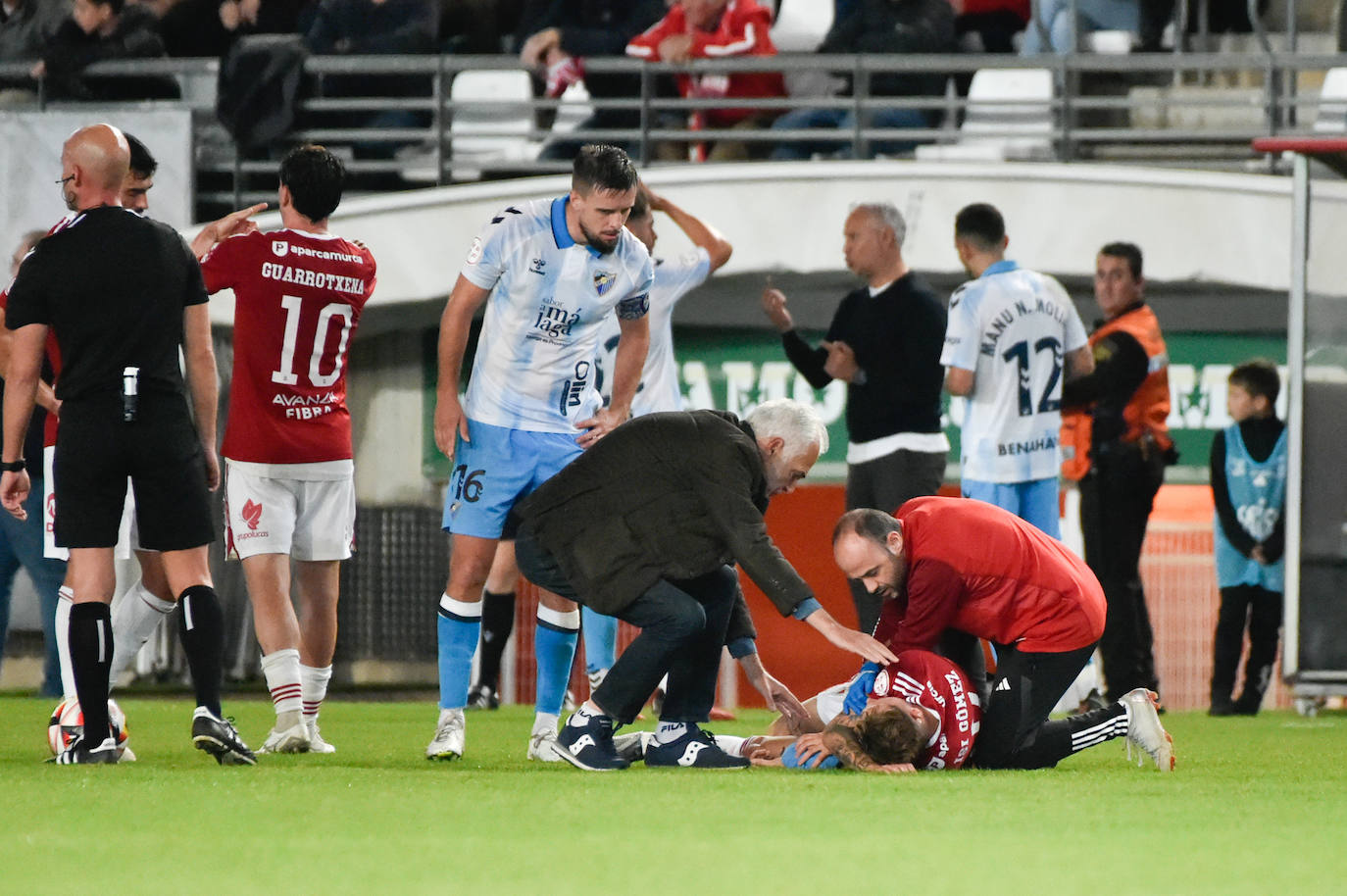 La derrota del Real Murcia frente al Málaga, en imágenes