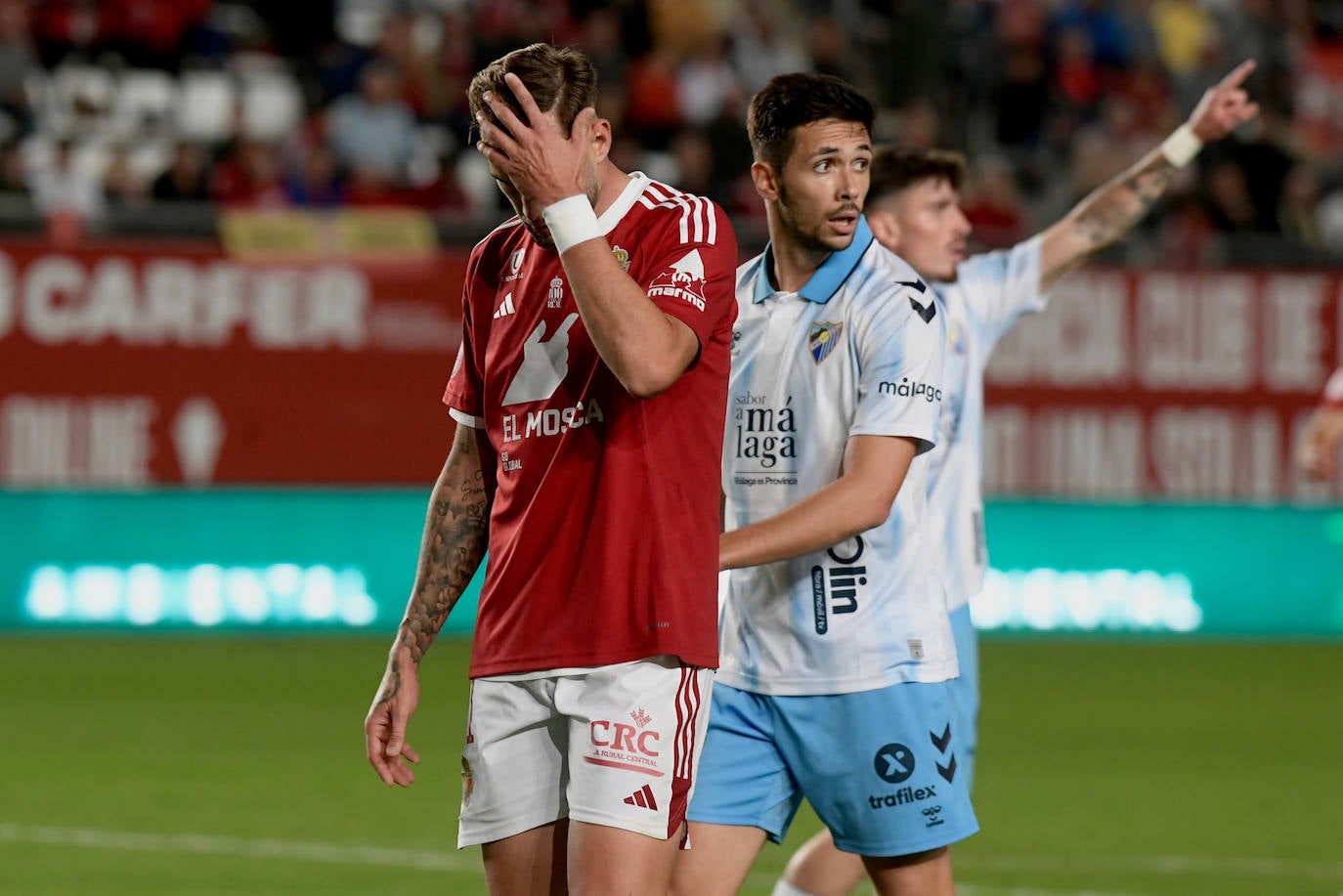 La derrota del Real Murcia frente al Málaga, en imágenes