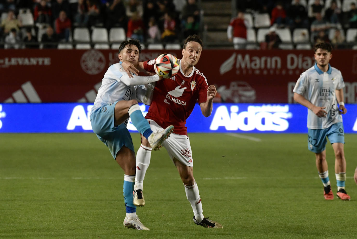 La derrota del Real Murcia frente al Málaga, en imágenes