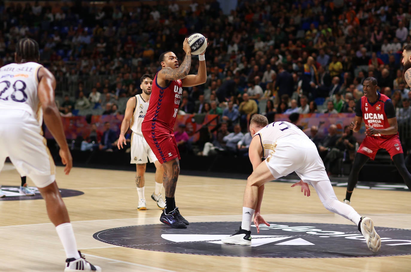 El partido Real Madrid - UCAM, en imágenes