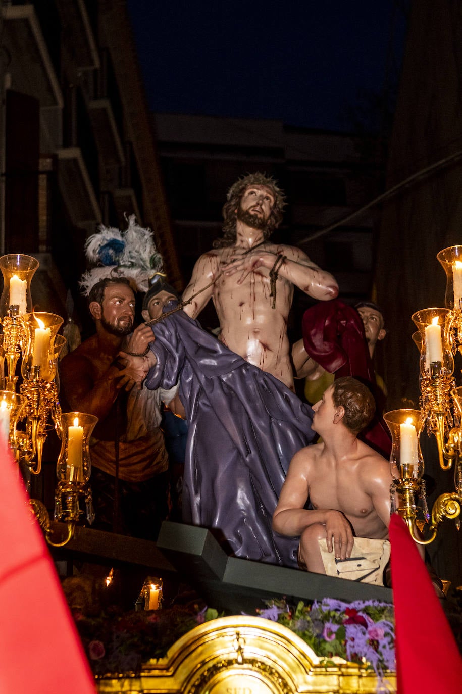 La procesión de la Caridad del Sábado de Pasión de Murcia, en imágenes