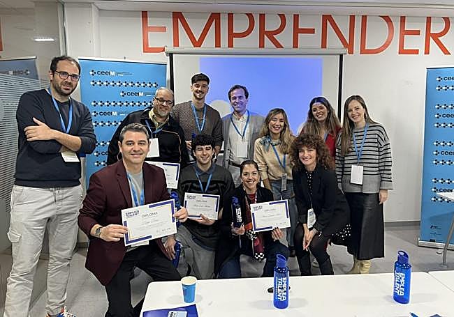 Ganadores y organizadores.