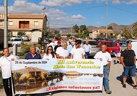 Vecinos en la manifestación por el aniversario de la riada, en una imagen de archivo.
