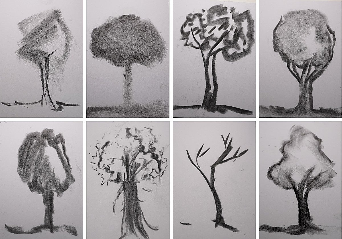 Árboles pintados con carbones de árboles arrasados en Cualedro (Orense).