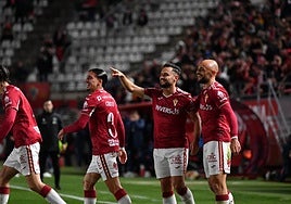 Schalk, junto a Ekain tras el 1-0, también fue felicitado por Cristo Romero y Andrés López.