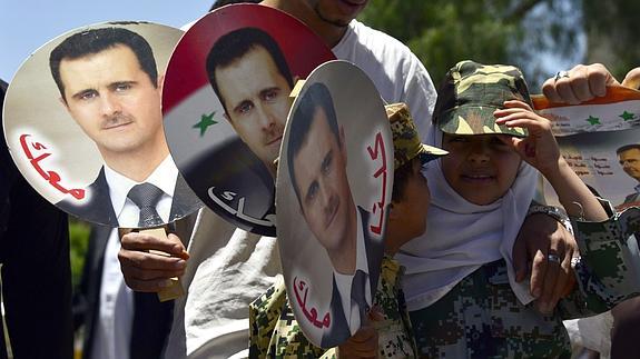 Manifestación en apoyo a El-Asad