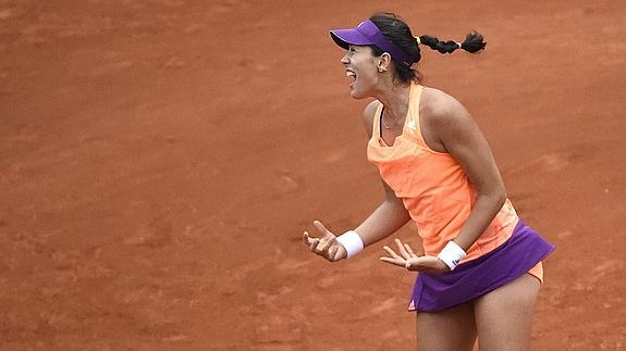 Muguruza celebra la victoria.