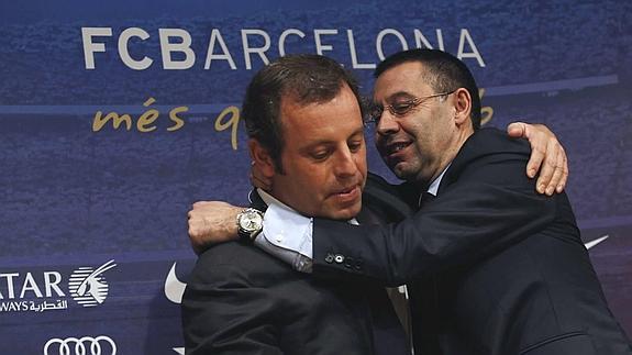 Bartomeu se despide de Rosell tras su dimisión. 