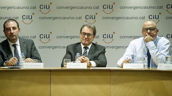 El secretario general de CiU, Ramon Espadaler, el presidente de CiU, Artur Mas, y Lluís Corominas 