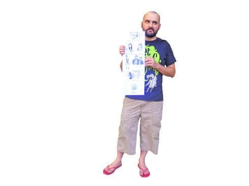 Ángel Palomo, con algunas de sus ilustraciones.
