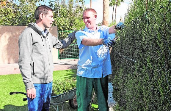 Kike Boned, junto a Juan Antonio, en las instalaciones del Olimpic Club. 