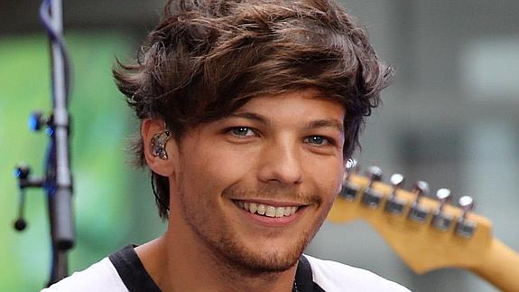 One Direction: Louis Tomlinson aleja los rumores de homosexualidad junto a una misteriosa rubia