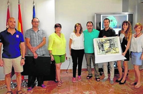 Ángel Haro (4d) junto a los ganadores del concurso. 