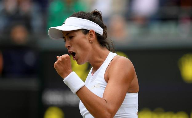 Garbiñe Muguruza celebra la victoria. 