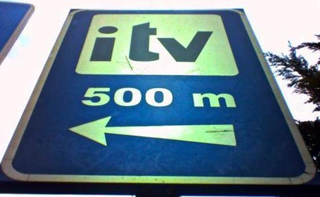 Cartel de un centro de ITV.