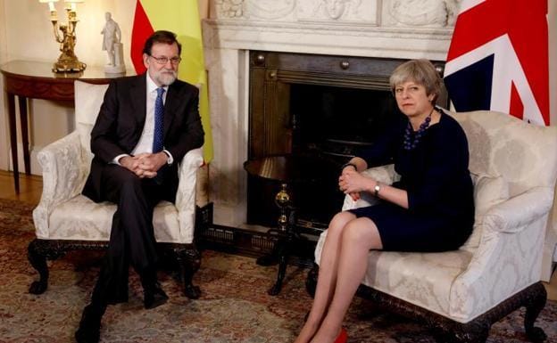 Rajoy y May. 