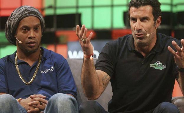 Ronaldinho y Luis Figo, durante la presentación del Web Summit de Lisboa.