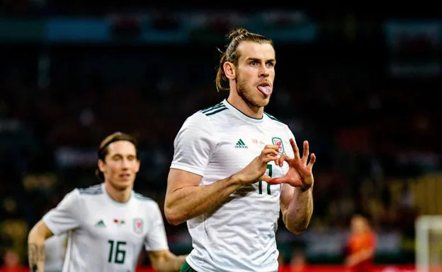 Gareth Bale celebra uno de sus tres goles ante China. 