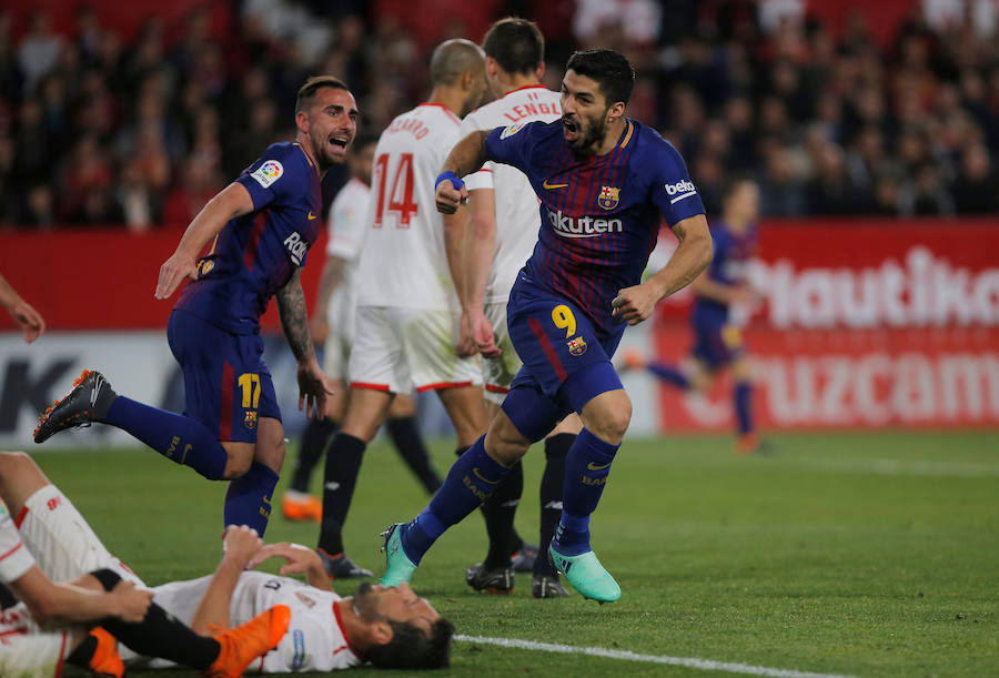 El líder salvó un punto en su visita al Sánchez Pizjuán (2-2) al neutralizar con tantos de Luis Suárez y Messi los goles de Franco Vázquez y Muriel.
