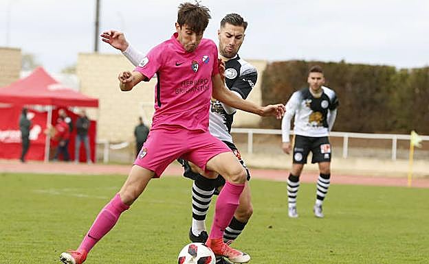 Un lance del partido.