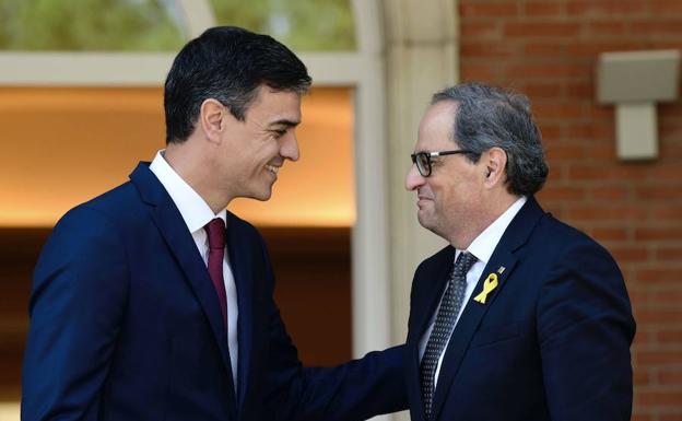 El presidente del Gobierno, Pedro Sánchez, junto al presidente de la Generalitat, Quim Torra.