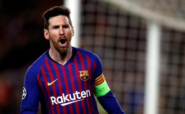 Leo Messi celebra uno de sus dos goles al Lyon 