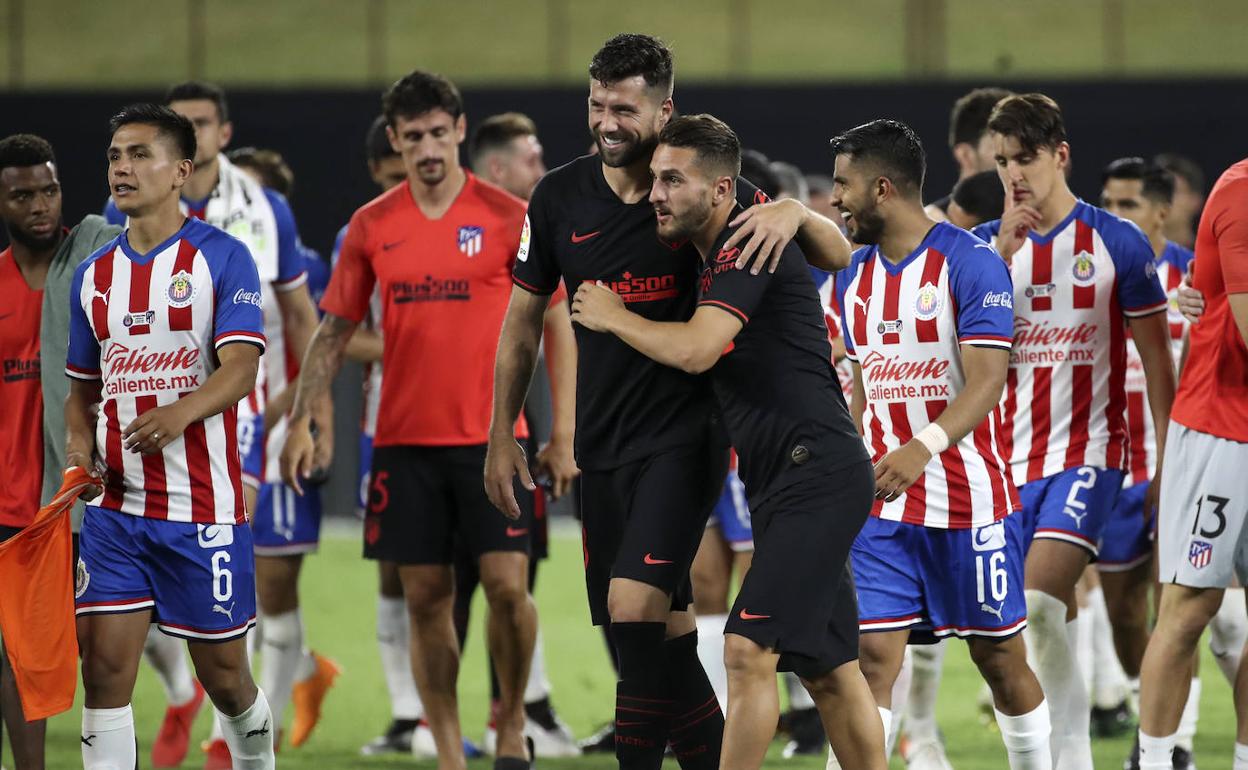 Felipe y Koke celebran la victoria. 